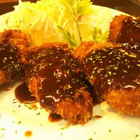 fried chicken with some demi-glace sauce