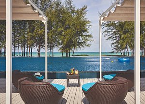 Splash Beach Resort in Phuket, image may contain: Scenery, Outdoors, Chair, Resort