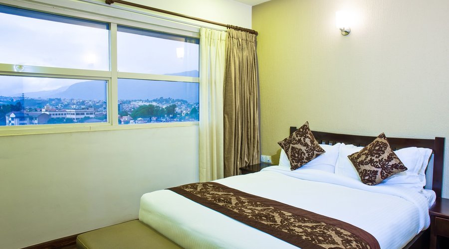 Bedroom of a 1 bedroom Suite