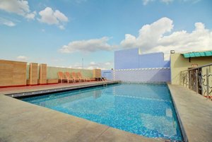 Hotel Heritage Residency in Madurai, image may contain: Pool, Water, Swimming Pool, Hotel