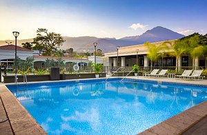 Plaza Hotel & Suites in San Salvador, image may contain: Hotel, Resort, Villa, Plant