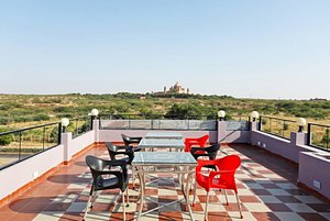 OYO 9852 Leela Villas Guest House in Jodhpur, image may contain: Balcony, Building, Chair, Furniture