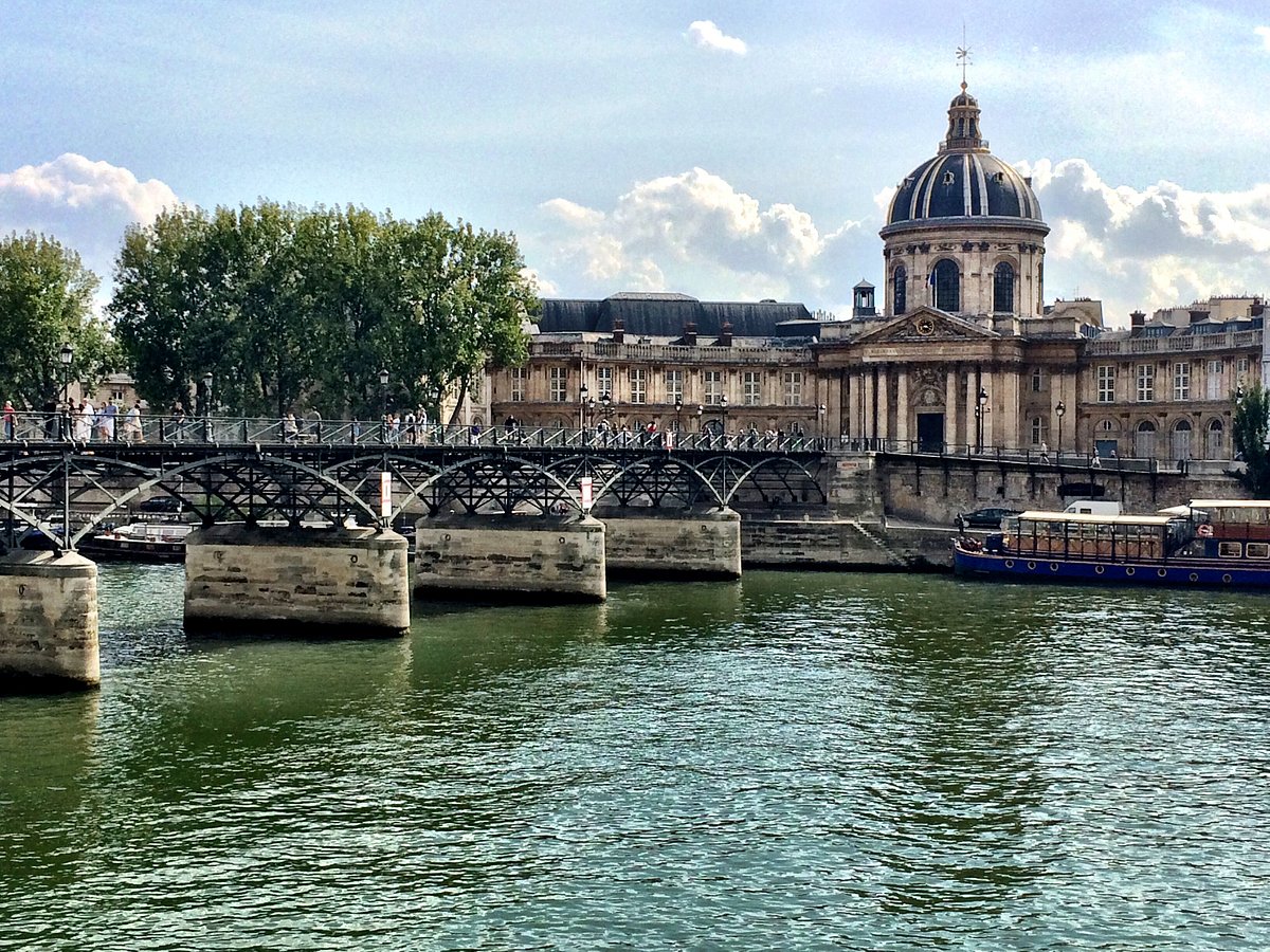 Put a Love Lock on Pont des Arts Bridge in Paris