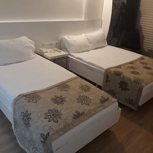 Kayseri Kosk Hotel in Kayseri, image may contain: Furniture, Bed, Hostel, Housing