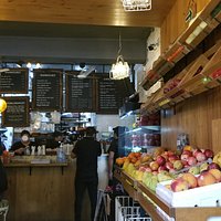 Fruit stands leading up to counter