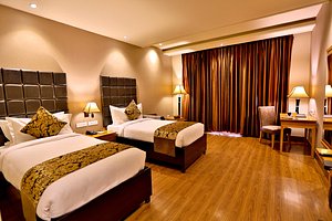 Regenta Resort Bharatpur in Bharatpur, image may contain: Resort, Hotel, Wood, Lamp