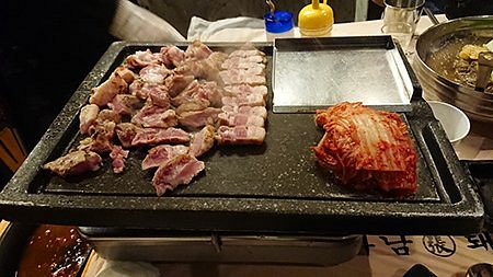 BBQ grill at our table, Amiso Korean Restaurant, Myeongdong District,  Jung-gu, Seoul. - Picture of Amiso, Seoul - Tripadvisor