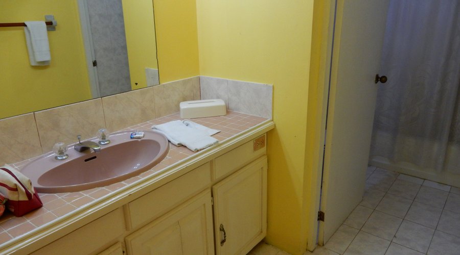 Slightly worn but spotless bathroom