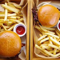 cheese burger with fries served in our bamboo serving trays