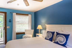 The Towne Motel in Camden, image may contain: Home Decor, Cushion, Lamp, Bedroom