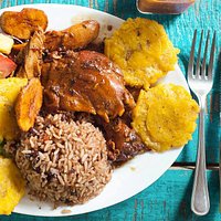 Our Caribbean Chicken, rice and beans and fried green plantains!