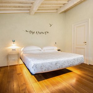 Relais degli Angeli in Siena, image may contain: Furniture, Indoors, Bedroom, Home Decor