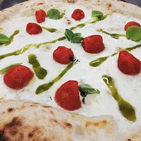 Pizza bianca con pomodorini confit