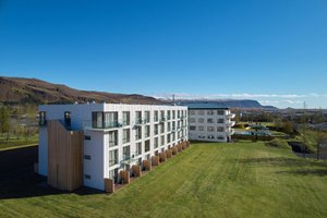 Hotel Ork in Hveragerdi, image may contain: Grass, Hotel, Lawn, City