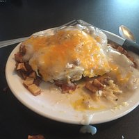 egg, cheese, biscuits and sausage gravy on home fries - comfort food breakfast for sure.