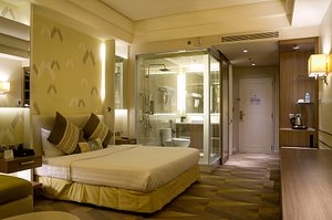 Hotel Benilde Maison De La Salle in Luzon, image may contain: Lighting, Bed, Flooring, Indoors