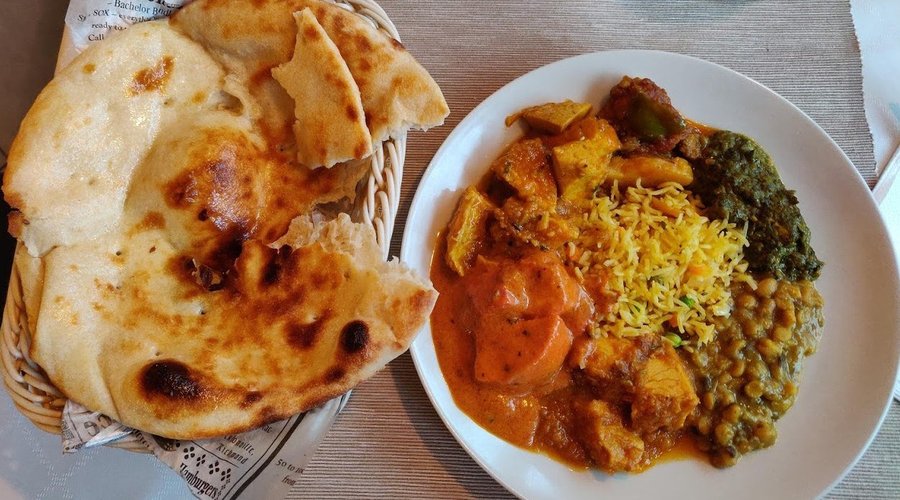 My late lunch and fresh warm Naan bread.