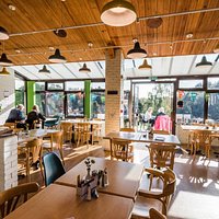 Our bright and spacious cafe has seating inside and outside on the terrace overlooking the gorgeous gardens. Wheelchair friendly and high chairs are also available.
Photo by Sharron Goodyear, International Photographer