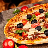 Thin crust!Home-made dough. Only 100% mozzarella cheese and fresh ingredients.