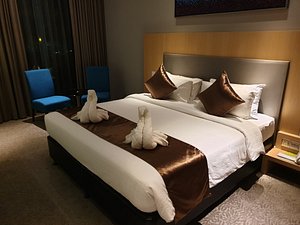 Greens Hotel & Suites in Bintulu, image may contain: Bed, Furniture, Chair