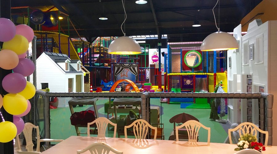Lots for little ones to do at Head Over Heels with their own exclusive gated area with play frame, music wall, role play village, ride on wheely bugs and soft play area.  