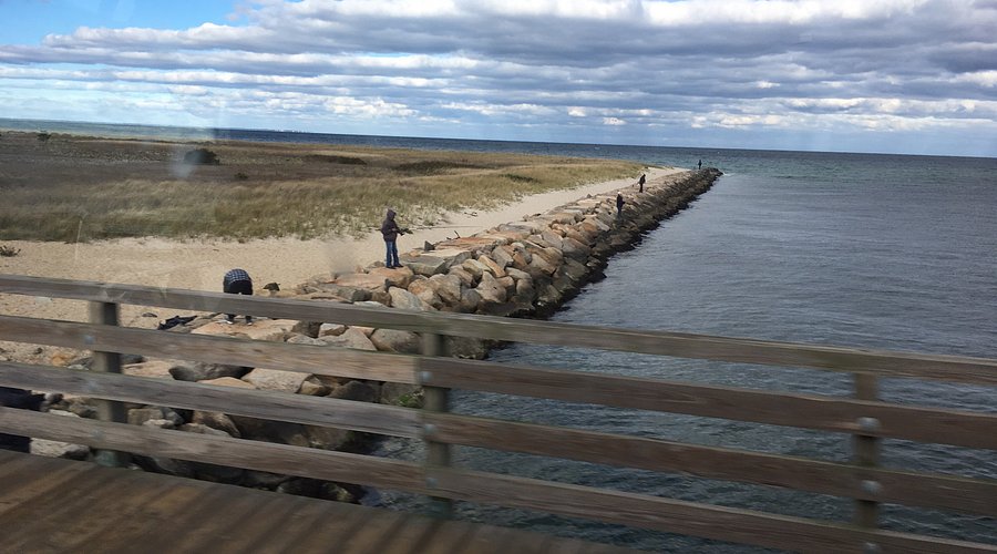 Beautiful view of Joseph Sylvia State Beach showcasing the iconic 'Jaws Bridge' over a channel