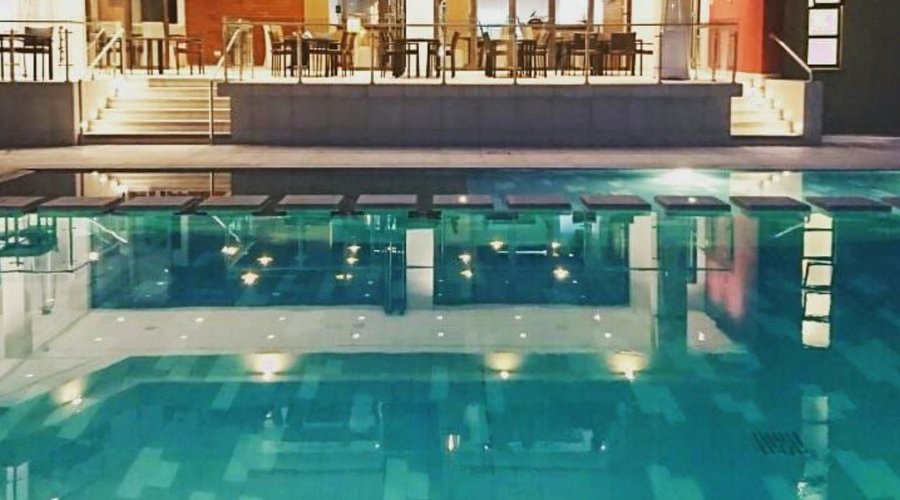 View of swimming pool and pool side restaurant