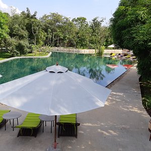 Templation Hotel in Siem Reap, image may contain: Resort, Hotel, Chair, Villa