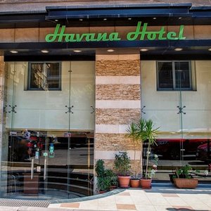 Havana Hotel Cairo in Cairo, image may contain: Furniture, Bed, Bedroom, Indoors