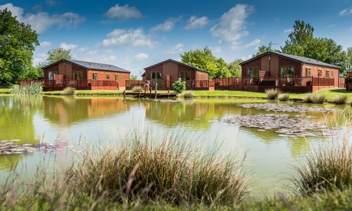 View across lake of lodges
