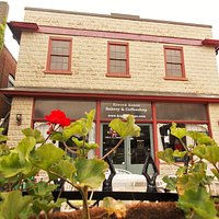 Look for our historic storefront, with outdoor patio seating.