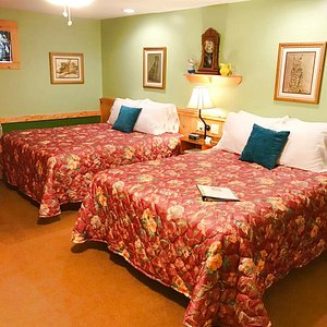 Hidden Valley Motel in Boone, image may contain: Bed, Furniture, Hotel, Dorm Room