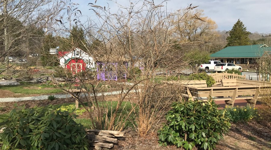 Springtime photo looking at deck and garden area