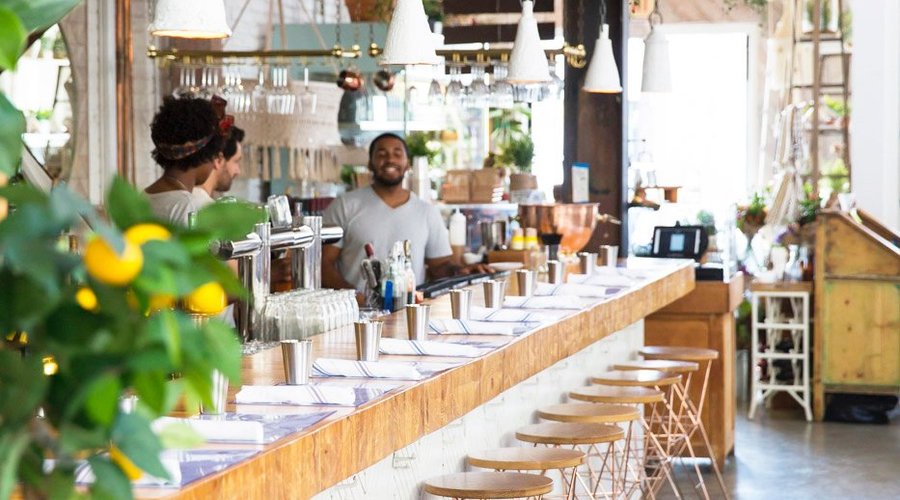 Grab a seat at the bar and enjoy a cocktail or juice.