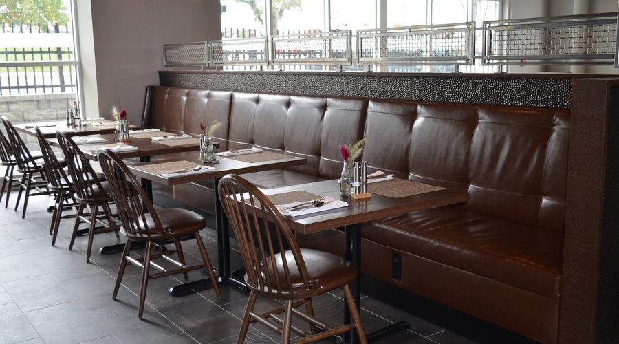 Comfortable seating with plenty of natural light creates a cozy atmosphere. 