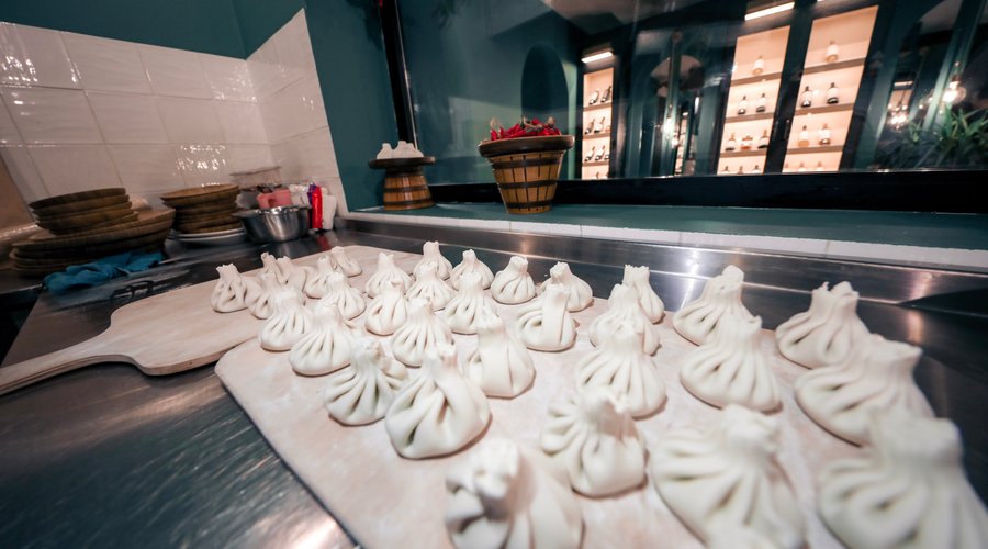 Khinkali - Georgian national dish and an essential part of Georgia. 
We kindly invite you in our Khinkali showroom. 
As Khinkali is much more than just a taste. Watch the whole preparation process and/or engage in it. Feel the taste of Georgian cuisine.

Хинкали - грузинское национальное блюдо и неотъемлемая часть Грузии.
Приглашаем вас в наш шоурум.
Хинкали - это нечто большее, чем просто вкус. Следите за процессом подготовки или участвуйте в нем. Почувствуйте вкус грузинской кухни лучше.
