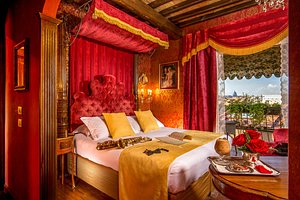 Boutique Hotel Campo de Fiori in Rome, image may contain: Furniture, Bedroom, Indoors, Bed