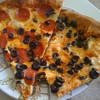 Our favorite: 20 inch pie with black olives and 1/2 pepperoni.