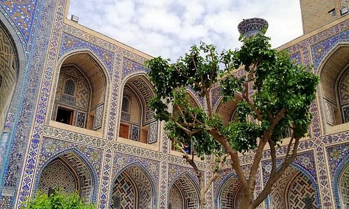 The Registan was the heart of the ancient city of Samarkand of the Timurid dynasty, now in Uzbekistan. The name Rēgistan (ریگستان) means "Sandy place" or "desert" in Persian.
The Ulugh Beg Madrasah, built by Ulugh Beg during the Timurid Empire era of Timur—Tamerlane, has an imposing iwan with a lancet-arch pishtaq or portal facing the square.