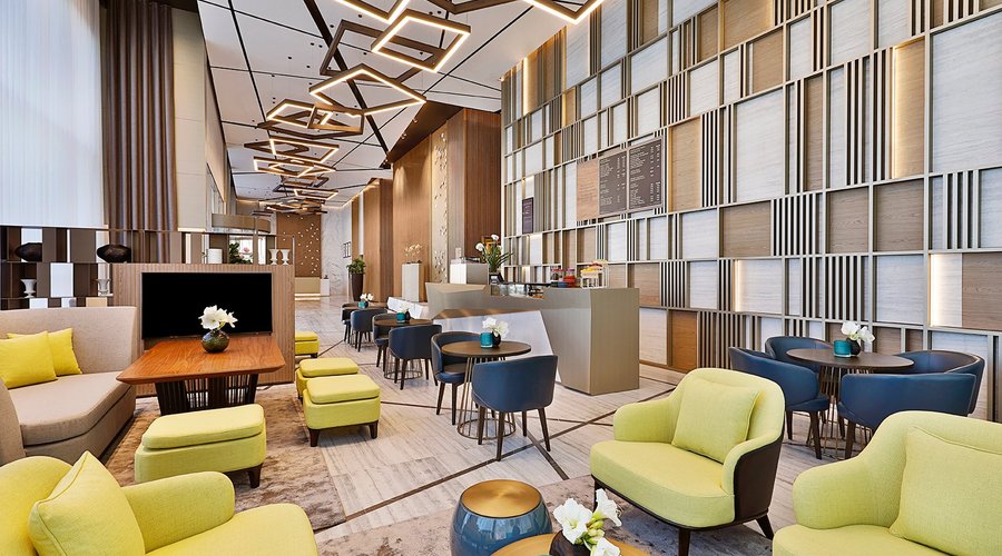 Enjoy a cup of coffee with friends or colleagues at our vibrant lobby café- Starbuzz Lounge