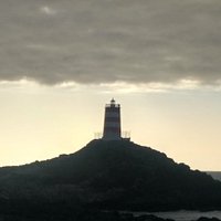 Faro de Punta Caldera al atardecer.