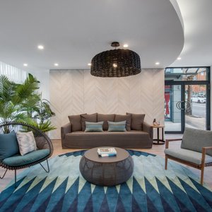 Adina Apartment Hotel Coogee Sydney in Coogee, image may contain: Living Room, Home Decor, Monitor, Screen