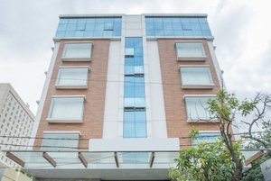 Silverstar Hotel in Bengaluru, image may contain: City, High Rise, Urban, Apartment Building