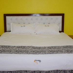 Spacious King size bed with comfortable and clean linen 