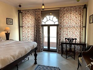 Haveli Inn Pal in Jodhpur, image may contain: Door, Chair, Bed, Housing
