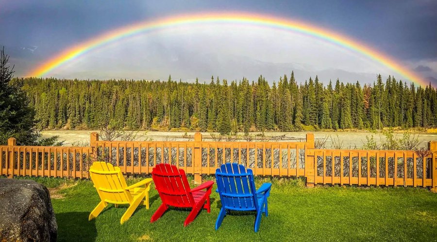 The view from our Riverfront Chalets for 4 and 6, along with the view from our Gourmet Restaurant and Front desk. 