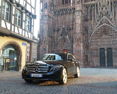 STRASBOURG, FRANCE - SEP 21, 2014: White Mercedes-Benz E Class taxi parked  on a rainy day in center of Strasbourg, place Kleber next to cafe Stock  Photo - Alamy