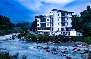 Hotel River Retreat in Kangra, image may contain: Hotel, Resort, Condo, City