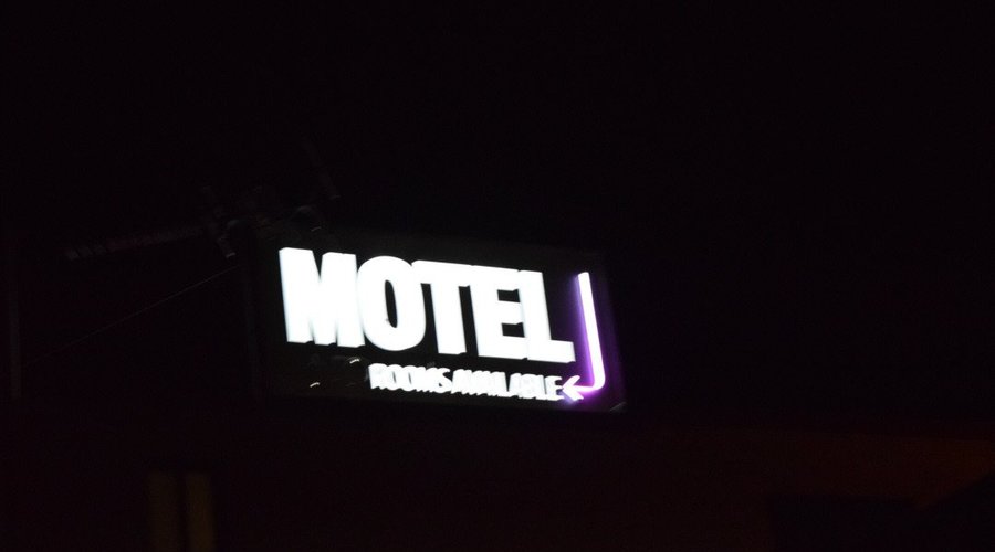Our Motel Sign lit up for the night
