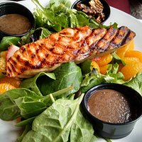 My friend's grilled salmon salad (with the pecans on the side), also with mixed, baby greens, mandarin orange and strawberries.